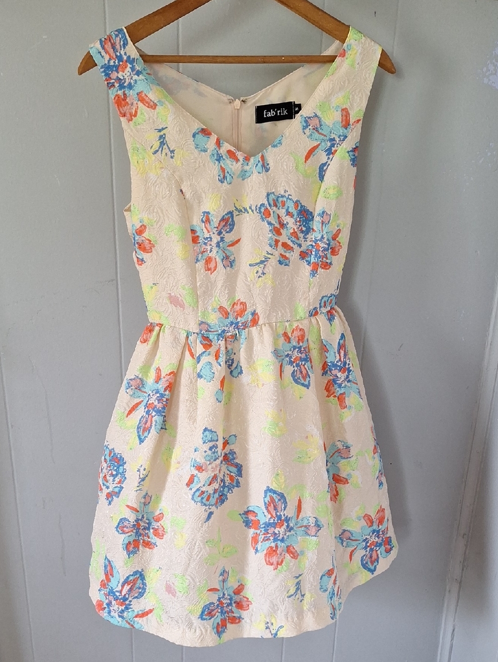 fab'rik Cream Floral Sleeveless Fit-and-Flare Dress with Blue and Coral Accents